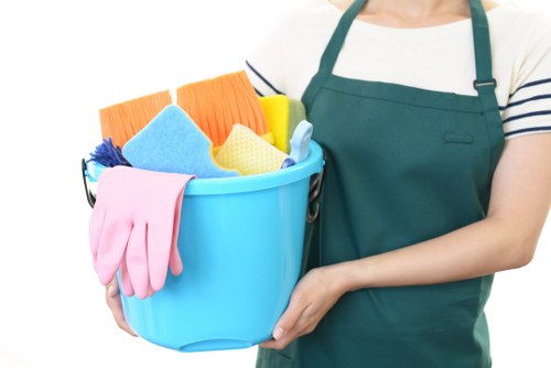 Office cleaning team maintaining a modern reception area