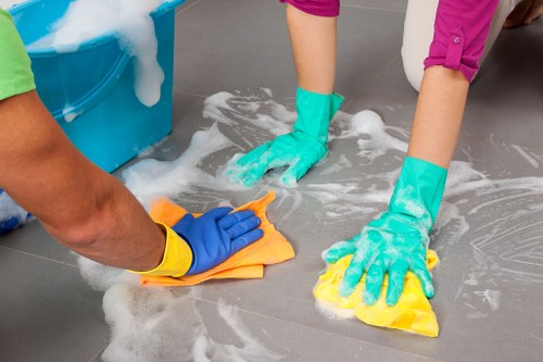 Kitchen tools and baking soda used for oven cleaning