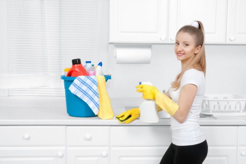 Cleaner polishing glass and surfaces in a premium Canary Wharf building