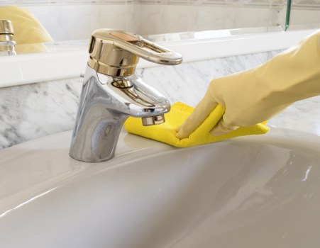 Sanitizing high-touch office surfaces in a workplace